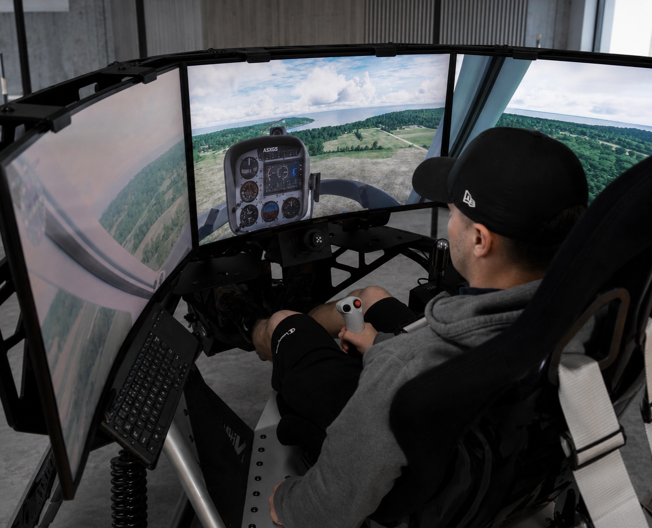 TORQ EVO 2 helicopter flight simulator — pilot with collective and triple screens